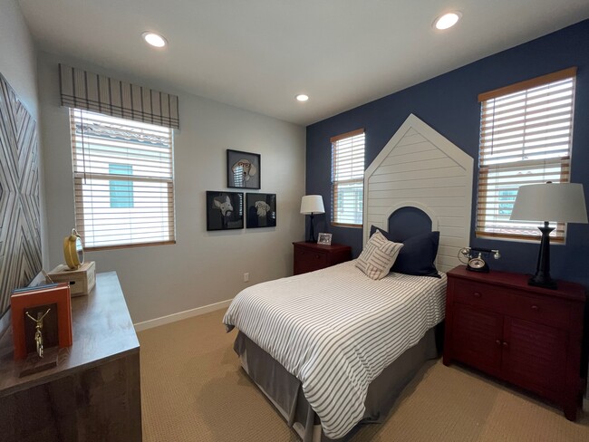 Secondary Bedroom - decorated perfectly for dog lovers, with twin-sized bed - 27661 Park Circle Way