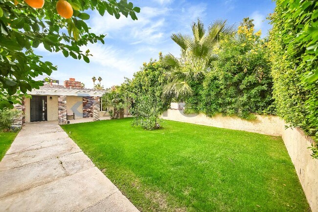 Foto del edificio - 32771 Whispering Palms Trail