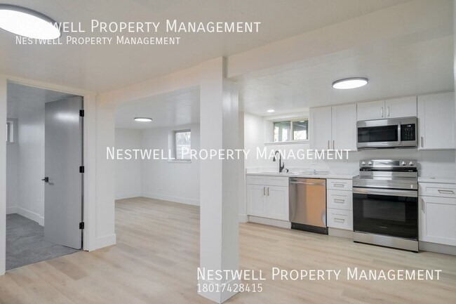 Building Photo - $500 OFF 1ST MONTH'S RENT - 2-bed Basement...