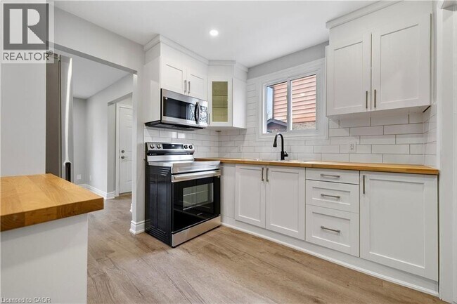 Photo du bâtiment - 8059 Aintree Dr