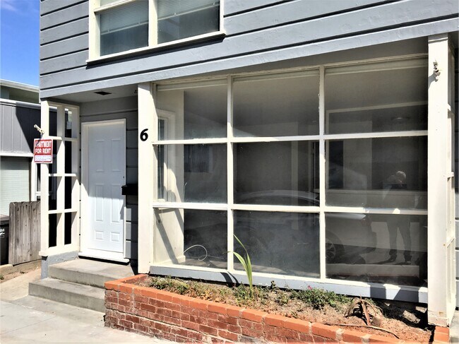 front door and living room windows - 6 62nd Pl
