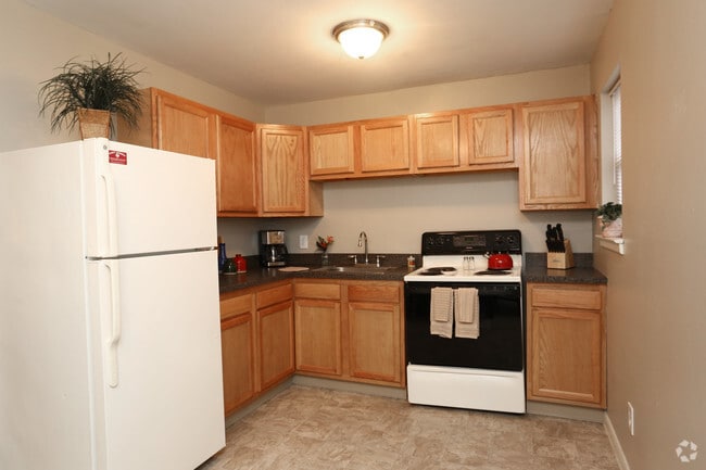 Casa adosada de 2 habitaciones y 1 baño (821 pies cuadrados) - Cocina - Scott Gardens Apartments