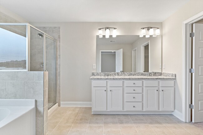 Building Photo - Single Family 3 Bedroom Townhome in Woodst...