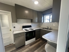 Building Photo - 110 E Beloit Ave Building Photo - 110 E Beloit Ave