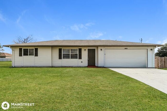 Building Photo - 1421 N E 7TH AVE, CAPE CORAL, FL 33909