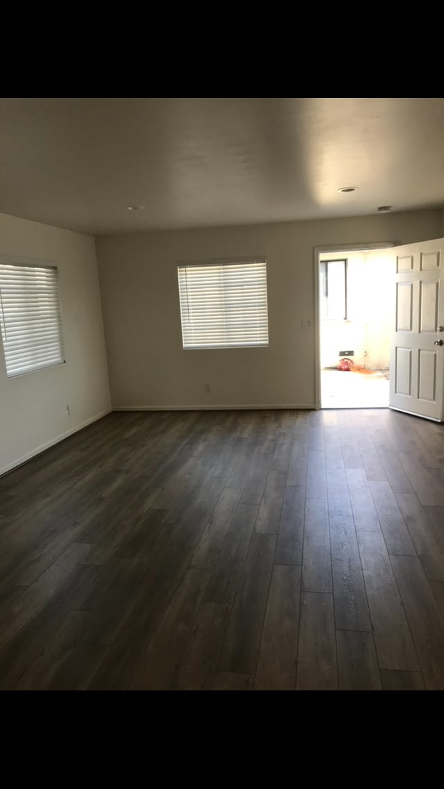 Standing against back wall looking at front door - 12420 Oxnard St