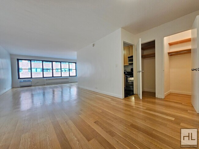 Building Photo - 1-Bedroom Apartment by Union Square | 5th Floor, Full-Service Building