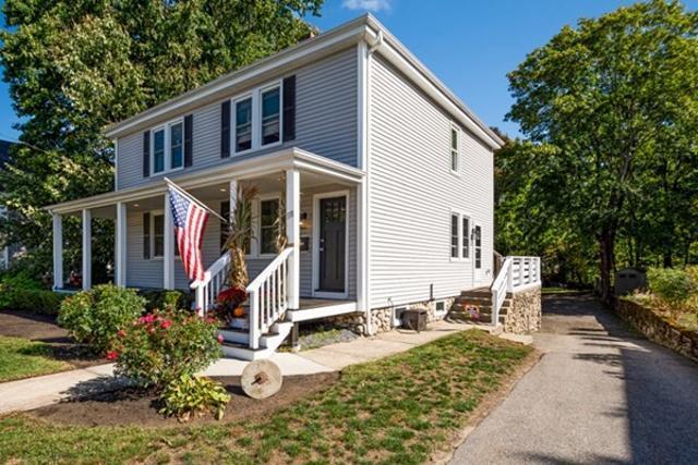 Front entrance and porch. Featuring a nicely landscaped lawn. - 118 Center Street