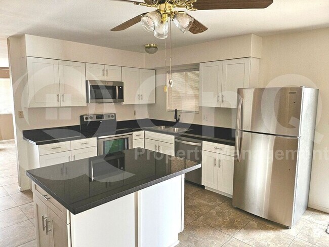 Building Photo - 4031 W El Camino Dr