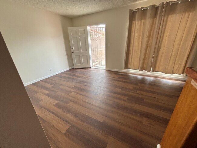 Living room - 9826 San Miguel Ave Apartments