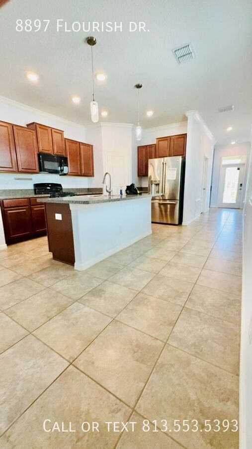 Building Photo - 8897 Flourish Dr.