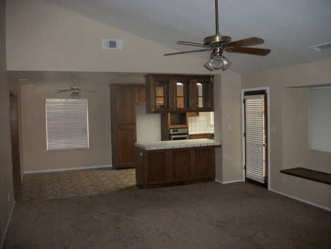 Building Photo - Coming Soon: Spacious Renovated 3 Bedroom Rosedale Home with Pool, Dual Fireplaces & Covered Patio