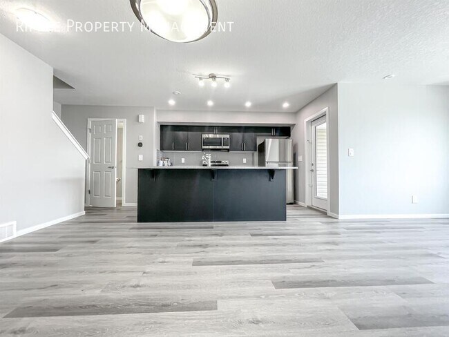 Building Photo - GREAT 2 BEDS/ 2.5 BATHS TOWNHOUSE IN THE COMMUNITY OF AIRDRIE