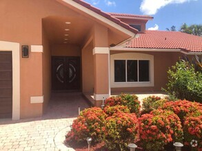 Building Photo - 8649 NW 57th Ct
