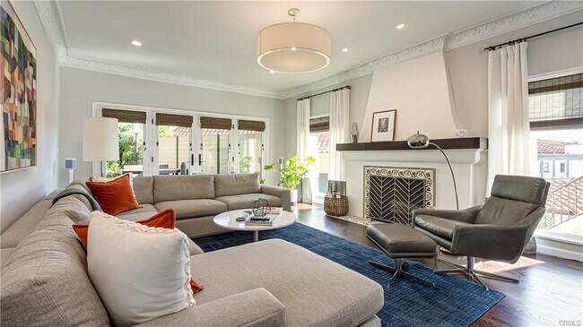 Spacious Liv Room leading to Tiled Patio - 8225 Lincoln Ter