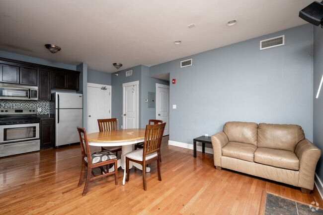 2BR, 2BA - 1,000SF - Living/Dining Room - The Bleachers