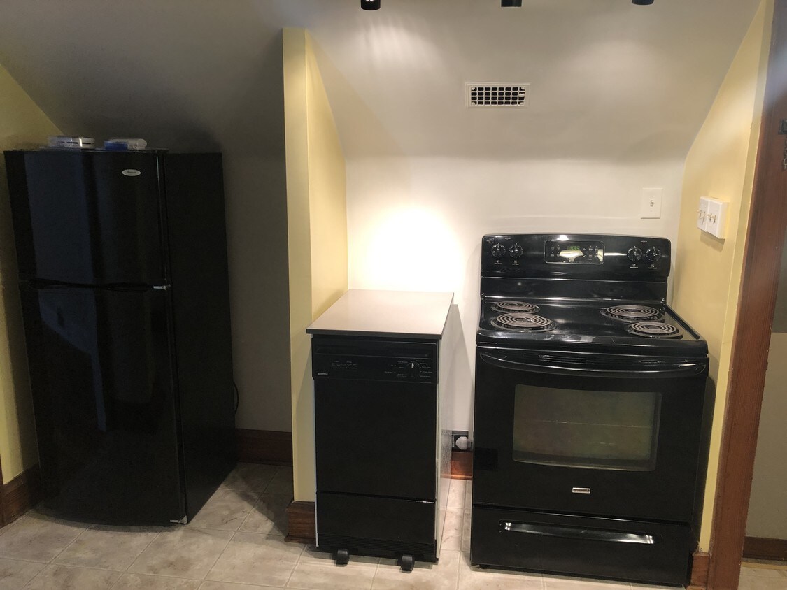 Fridge, portable dishwasher, electric stove - 4407 N Morris Blvd