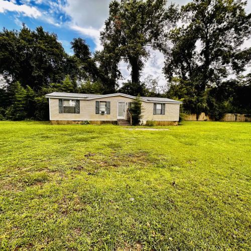 Building Photo - Whispering Pines