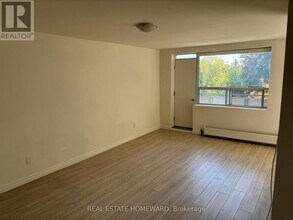 Building Photo - 1765 Lawrence Ave E
