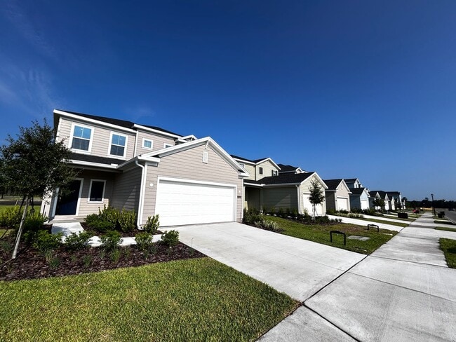 Building Photo - Brand New 4/3.5 Two Story Home with Loft. ...