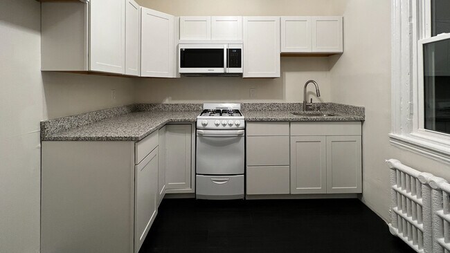BRAND NEW kitchen! - 7827 Montgomery Ave