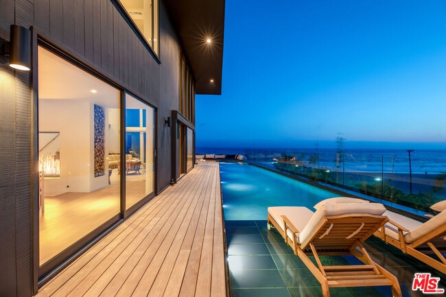 Building Photo - 6463 Surfside Way