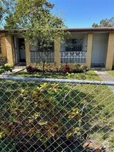 Building Photo - 9900 NW 10th Ave