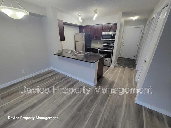 Building Photo - 3211 James Mowatt Trail SW