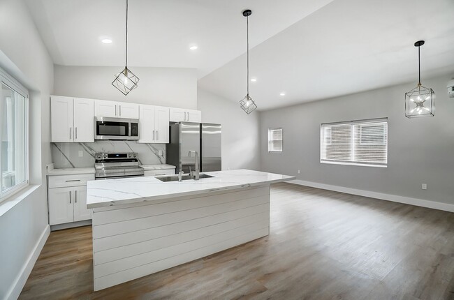 Photo - 3719-3721 Kirkup Ave Apartment