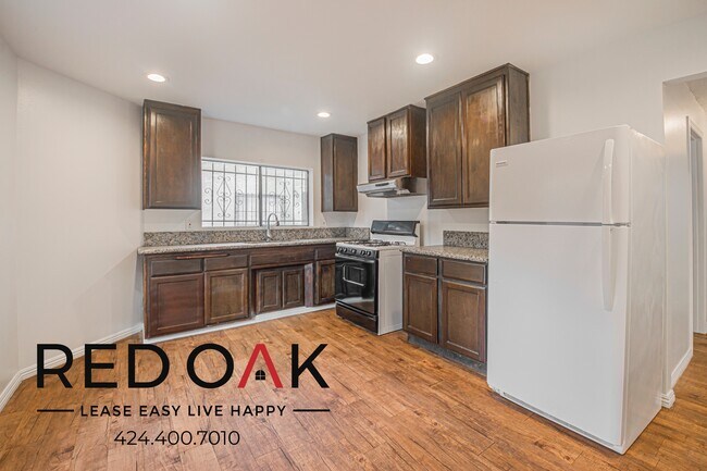 Building Photo - 1309 W 36th Pl