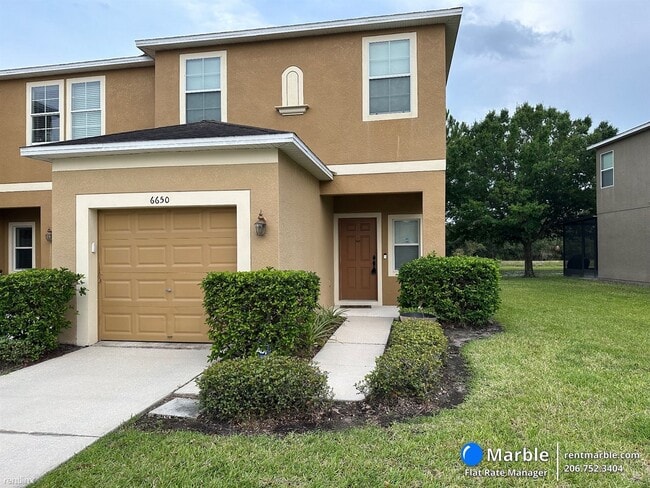 Building Photo - 3 br, 2.5 bath Townhome - 6650 Holly Heath Dr