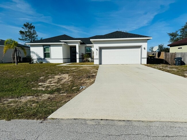 Building Photo - 4 Bedroom Gorgeous Poinciana Home!!
