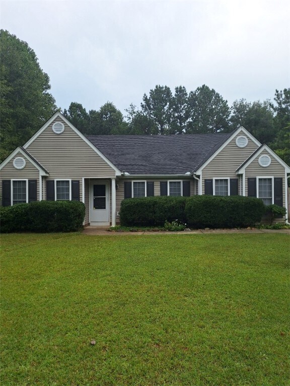 Foto del edificio - 405 Whispering Ln