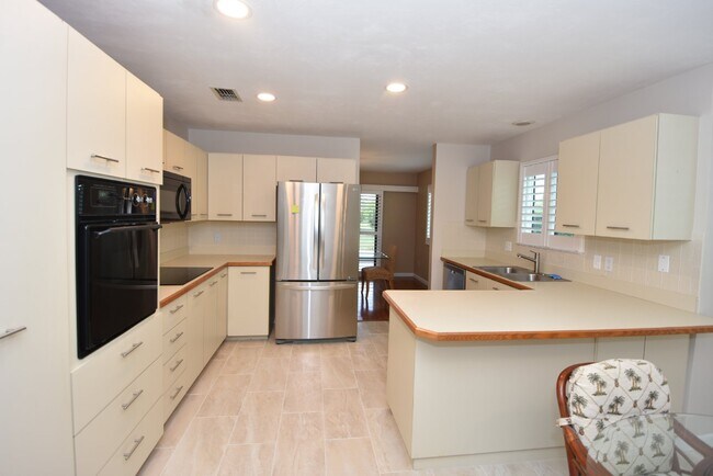 Building Photo - Plantation Bay- townhome. MOVE IN READY. 2...