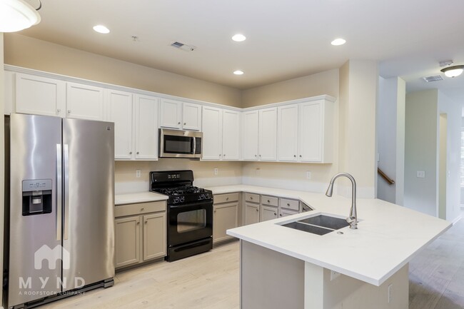 Foto del edificio - 4699 Creekside Villas Way