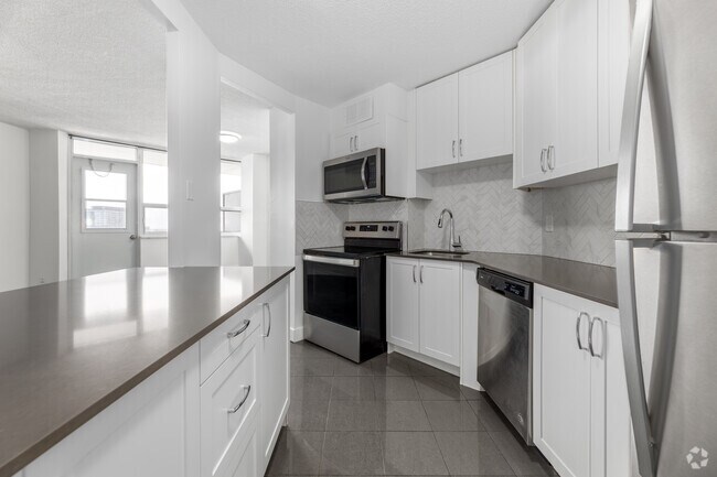 3 chambres, 1 salle de bain et demie - 96 m² - Cuisine - 3122 Hurontario Street