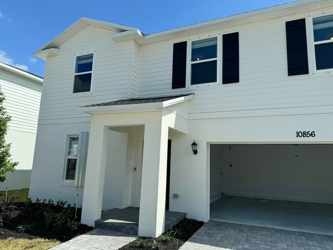 Building Photo - 10856 NW Everbreeze Dr