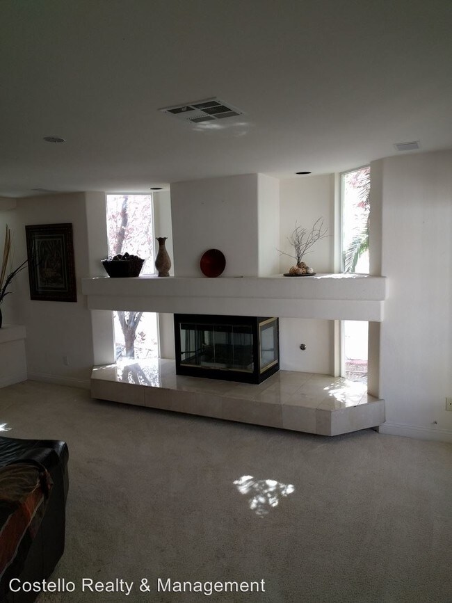 Building Photo - 4 br, 3 bath House - 8232 W. Deer Springs Way