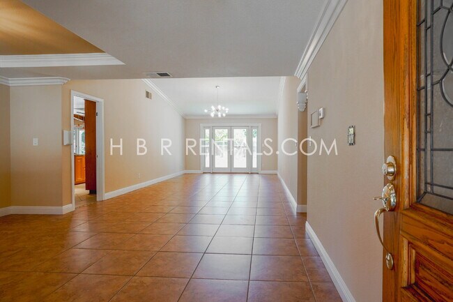 Building Photo - Charming 4-Bed with 3 Baths & Cozy Firepla...