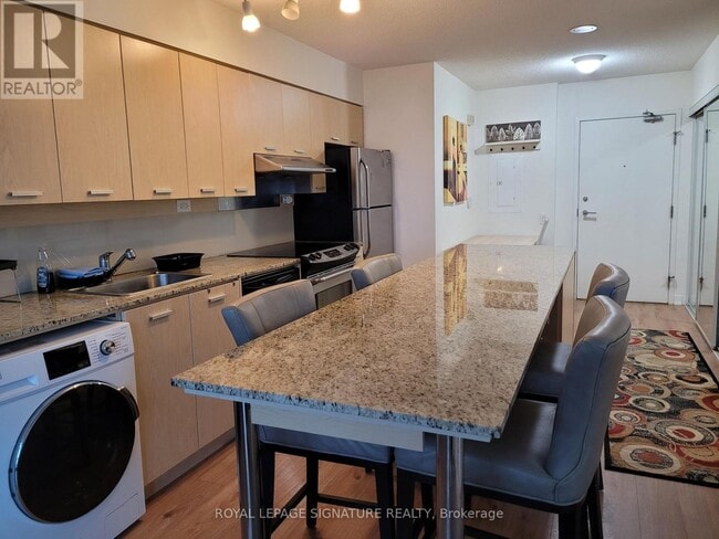 Photo du bâtiment - 15 Singer Ct