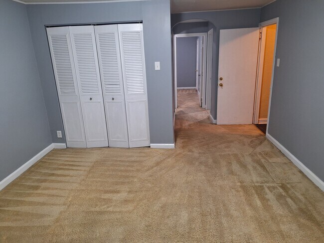 Living room is spacious with a big closet. - 6404 Marsden St.