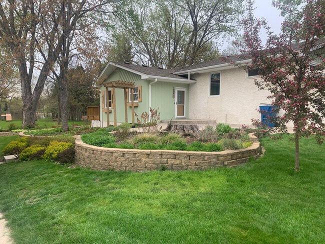 Side view of this wonderful home - 505 W River Pkwy