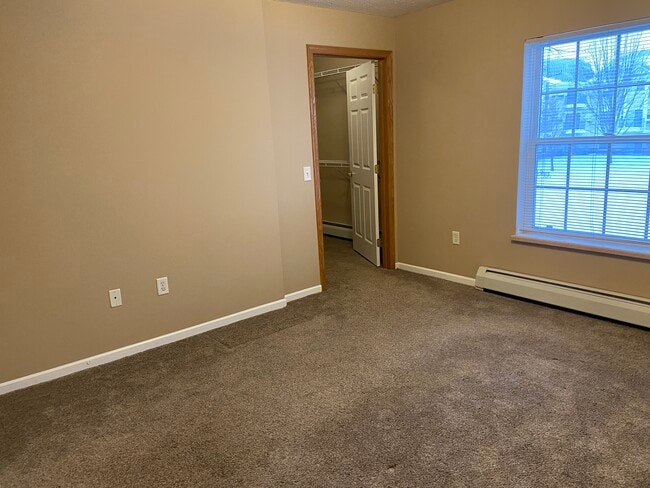 cama principal - Hidden Cove Apartments