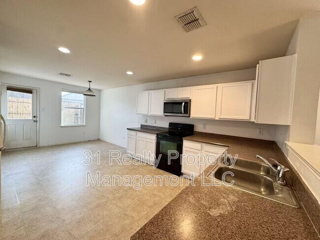 Foto del edificio - 9832 Dartmouth Dr