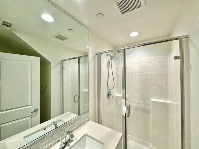 Building Photo - Spacious 4BD/3.5BA Townhome in Oceanside with Community Pool, 2-Car Garage & Covered Balcony
