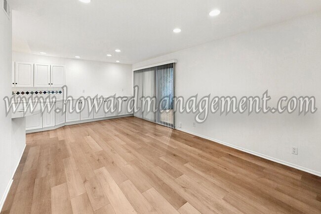Building Photo - LAKE VIEW in LA! Majestic townhouse with high ceilings, three patios and lake view!