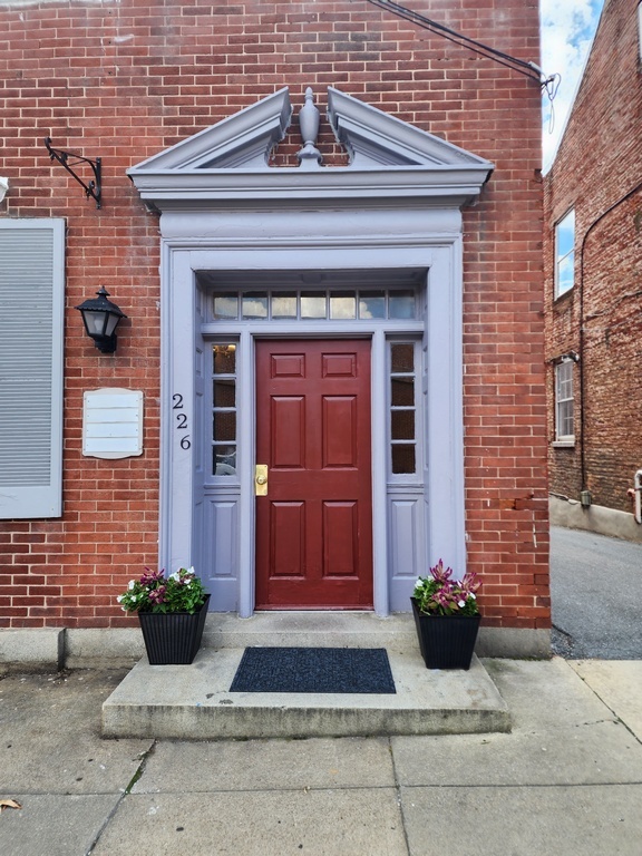 Front door street entrance (there are four other entrances) - 226 E Patrick St