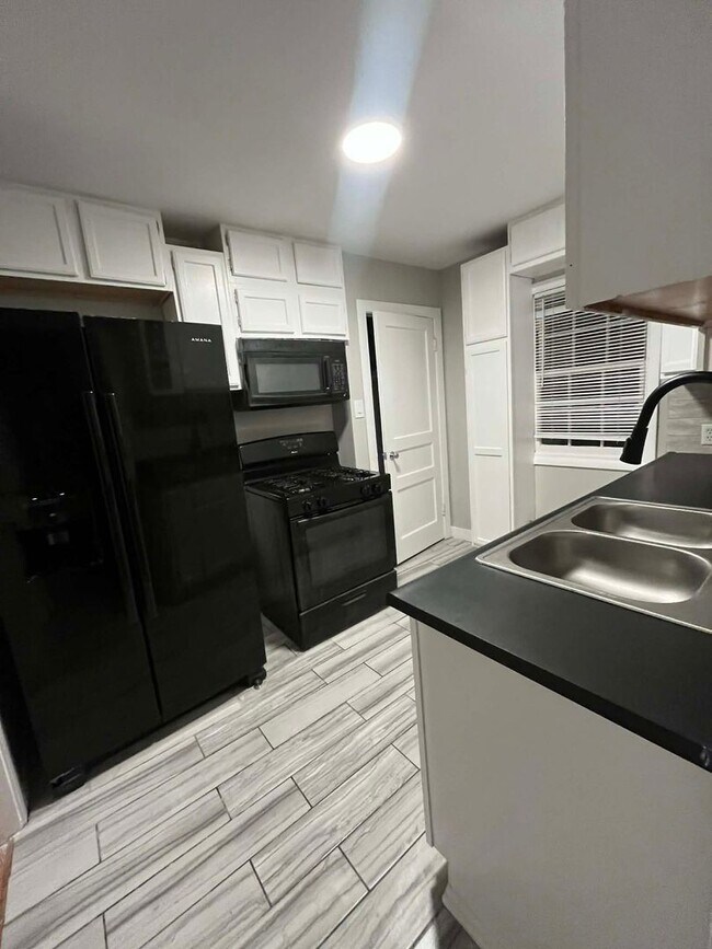 Building Photo - Welcome to Your Next Home with Harvest Management