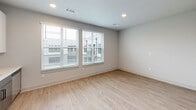 Embrace the Charlotte lifestyle in this sleek, move-in-ready 1-bedroom, 1-bathroom home at 4225 S Tryon St. Light-toned wood-style flooring flows throughout, creating a warm, cohesive ambiance. The generously sized bedroom is bathed in natural light from oversized windows and features dual closets for effortless organization. The spa-inspired bathroom stuns with bold black subway tile surrounding the soaking tub, matte black fixtures, a warm wood vanity, and clean white walls — a striking retreat to start and end your day. This is modern Charlotte living, designed for those who demand both style and comfort.