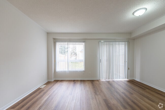 3BR, 2BA - 1,193SF - Living Room - Heartland South Townhomes